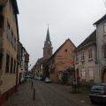 Grand-rue de Bergheim avec son église au loin.jpg